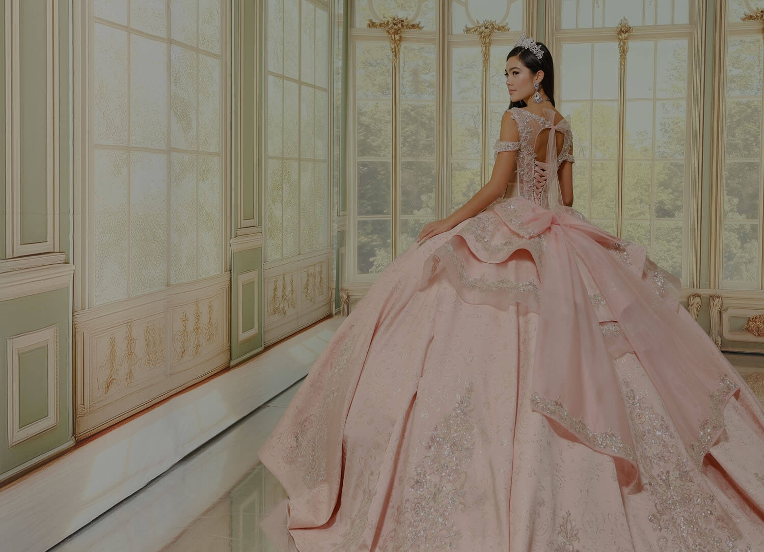 Model wearing a pink gown. Mobile image