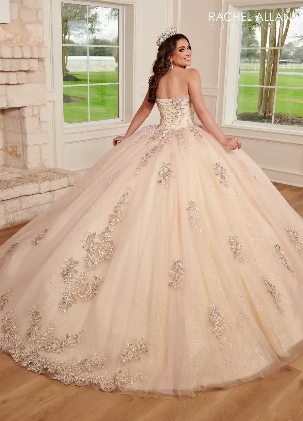 model is wearing a cream colored quince gown
