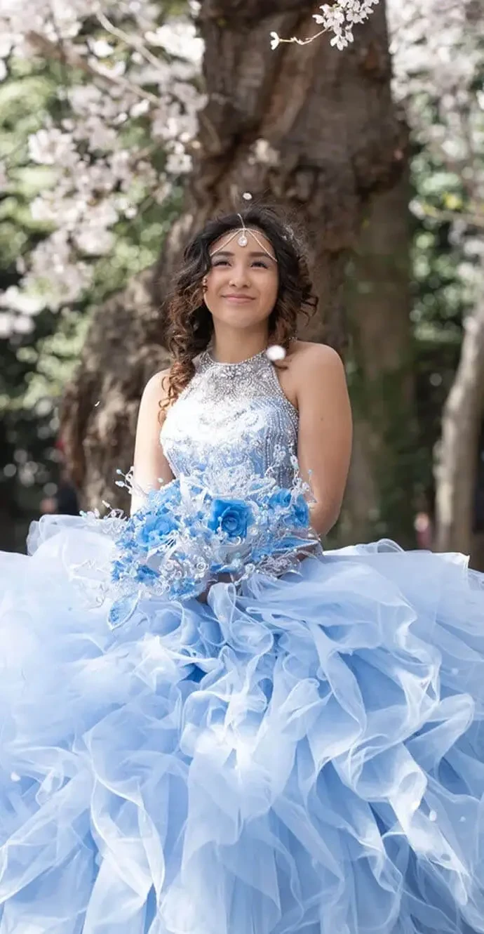 model wearing a blue gown